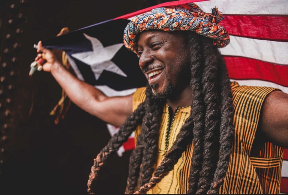 Liberian flag man at Africa LIVE!