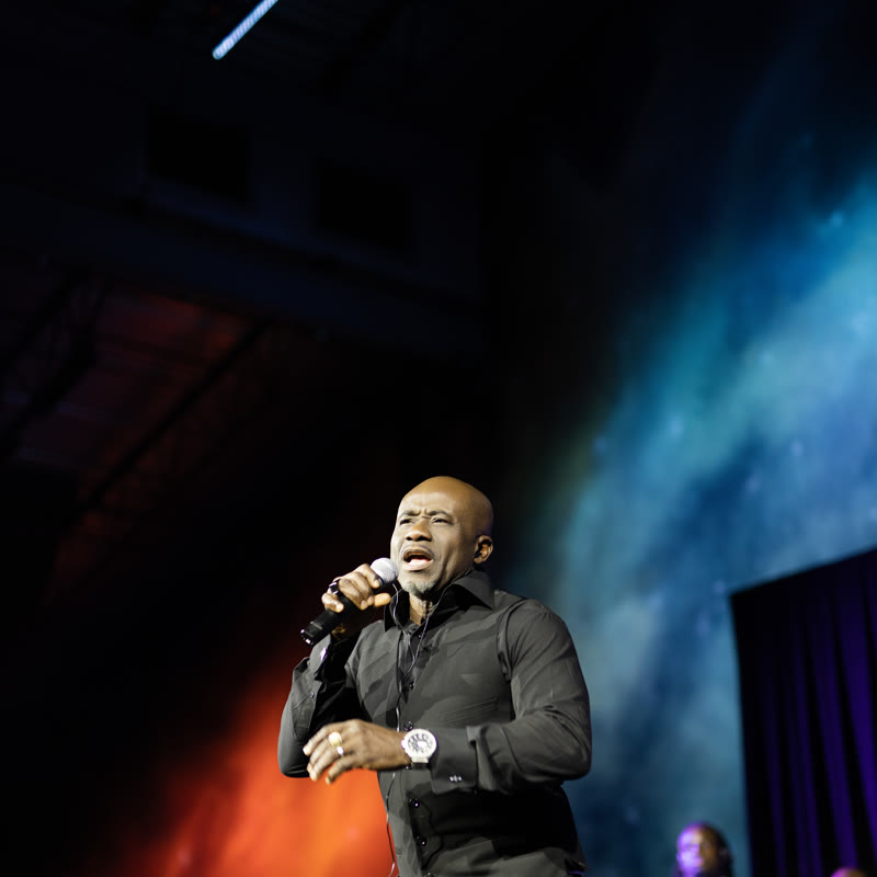 Vocalist on stage at Africa LIVE!